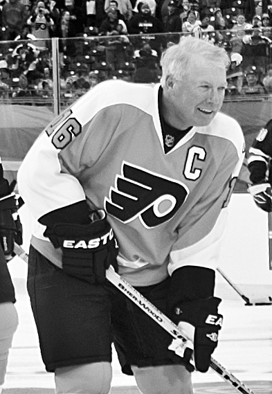 Picture of Bobby Clarke. Hockey Hall of Fame center Bob Clarke of the Philadelphia Flyers on the ice at Citizens Bank Park during the warmup for the 2012 NHL Winter Classic Alumni Game against the New York Rangers alumni. December 31, 2011.